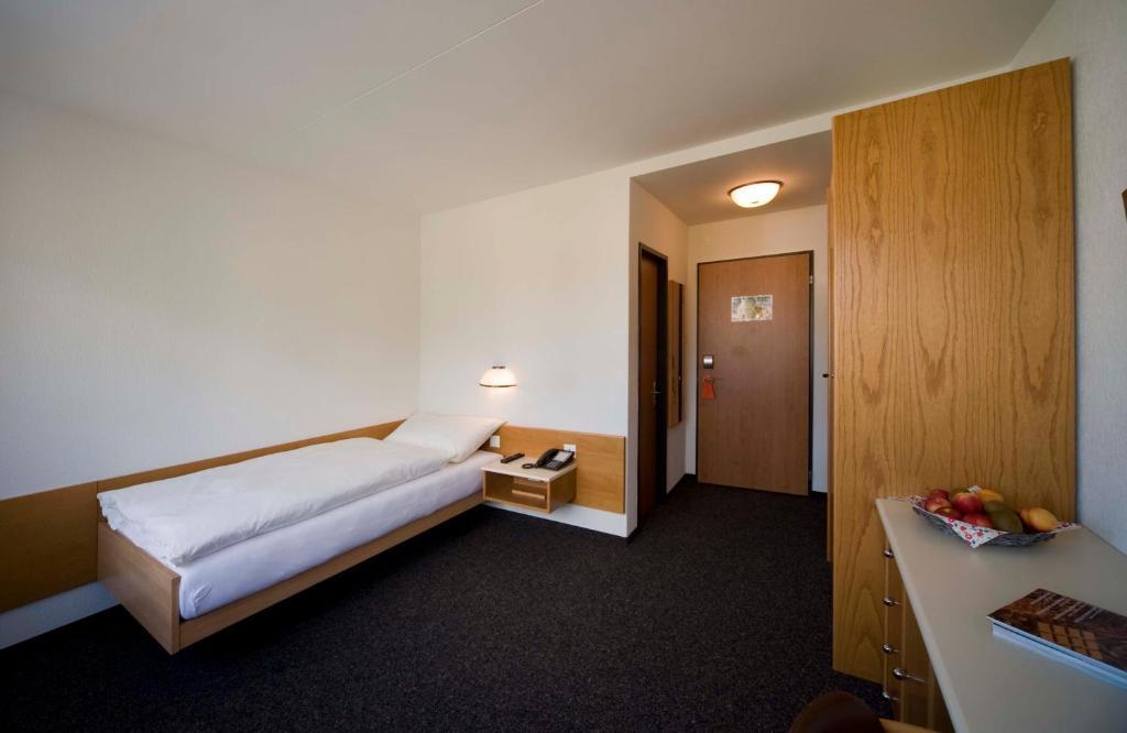 Hôtel Oasis Moutier Quarto foto