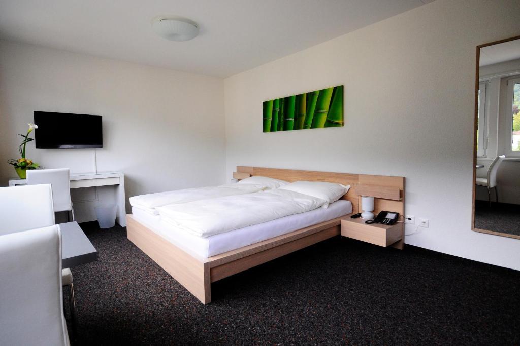 Hôtel Oasis Moutier Quarto foto